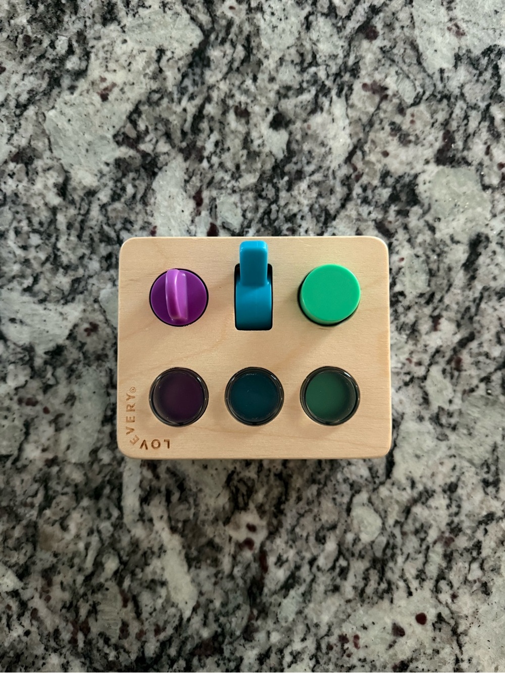 LOVEVERY Sensory Switchboard Wooden Color Pop Toddler Toy - Teal, Purple, Green